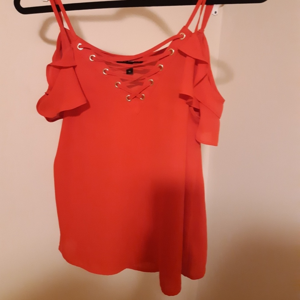 Ruffled sleeved red shirt.